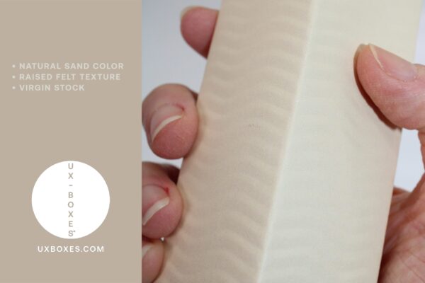wavy sand dropper box hand close-up
