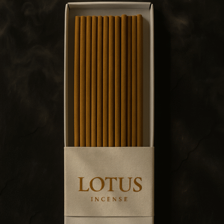 Top view of a DIY Incense White Packaging by UX BOXES® with a Colossal™ Box Band that reads: LOTUS INCENSE. The box lays flat on a black sandstone countertop