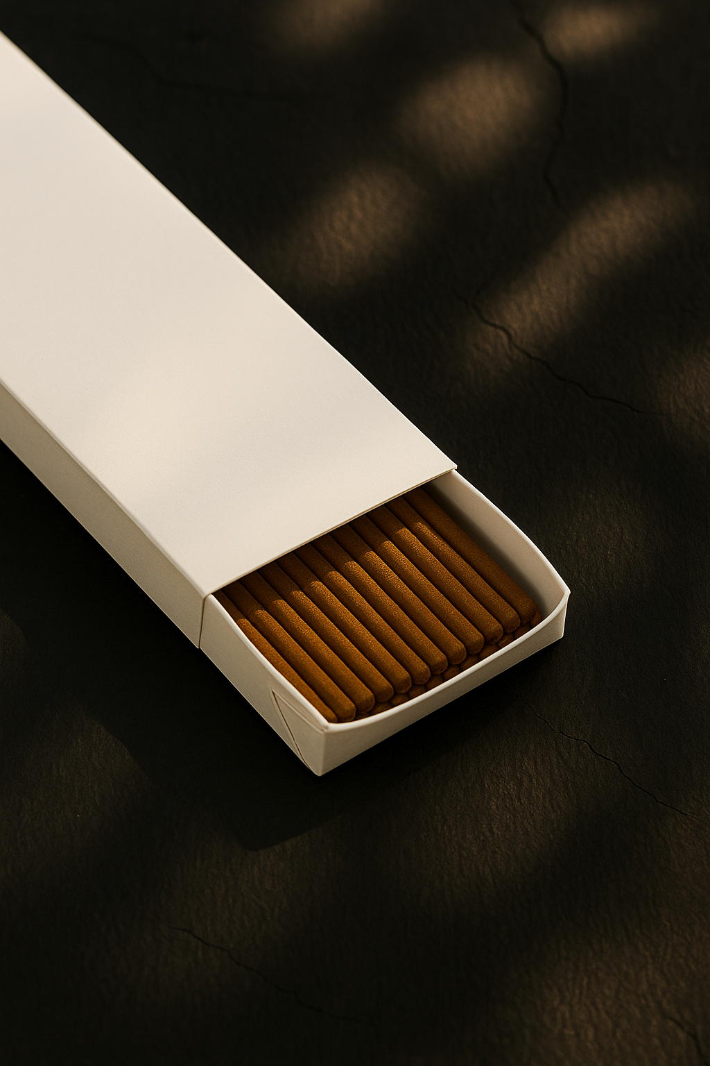 3-quarter view of a DIY White Incense Packaging by UX BOXES® on a black sandstone countertop