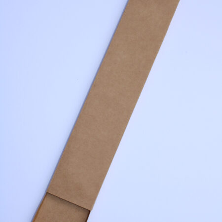 Front view of a handmade kraft paper incense slider box partially open, revealing the inner tray extending from the sleeve, set against a clean white background.