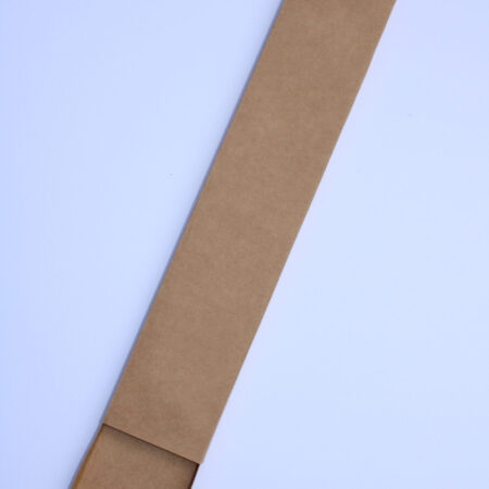 Front view of a handmade kraft paper incense slider box partially open, revealing the inner tray extending from the sleeve, set against a clean white background.