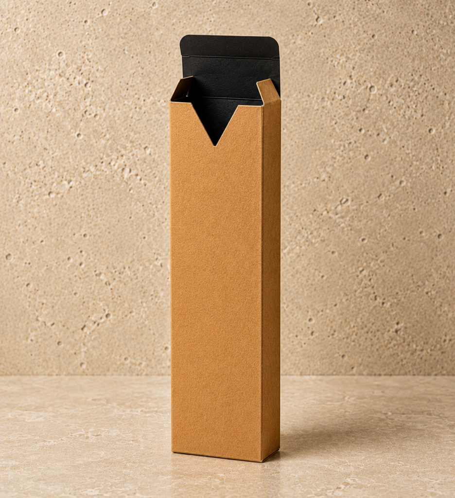 A closeup tall kraft incense packaging box with a signature V-cut front opening and elegant black interior. Luxury incense stick packaging mockup displayed upright against a neutral stone backdrop
