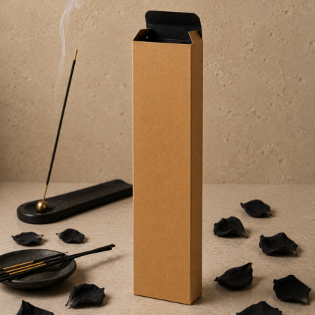 Standing kraft incense box with black interior with incense burning surrounded by black rose petals.