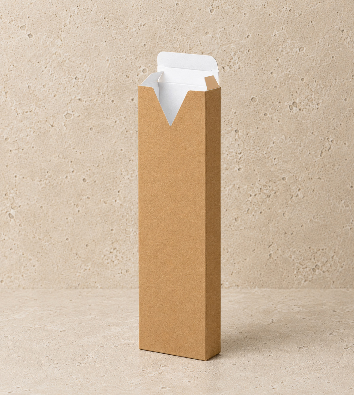 Premium kraft incense tuck box featuring a signature V-cut front opening and crisp white interior, shown open on a warm stone-textured background. The natural kraft exterior contrasts with the clean white interior, creating a refined, modern packaging presentation for incense sticks.