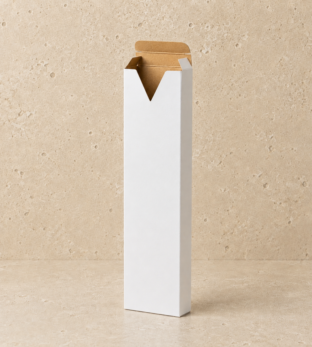 Minimalist white incense tuck box featuring a signature V-cut front opening and natural kraft interior, shown open on a warm stone-textured background. The clean white exterior contrasts with the kraft interior, emphasizing a modern, premium packaging design for incense sticks.